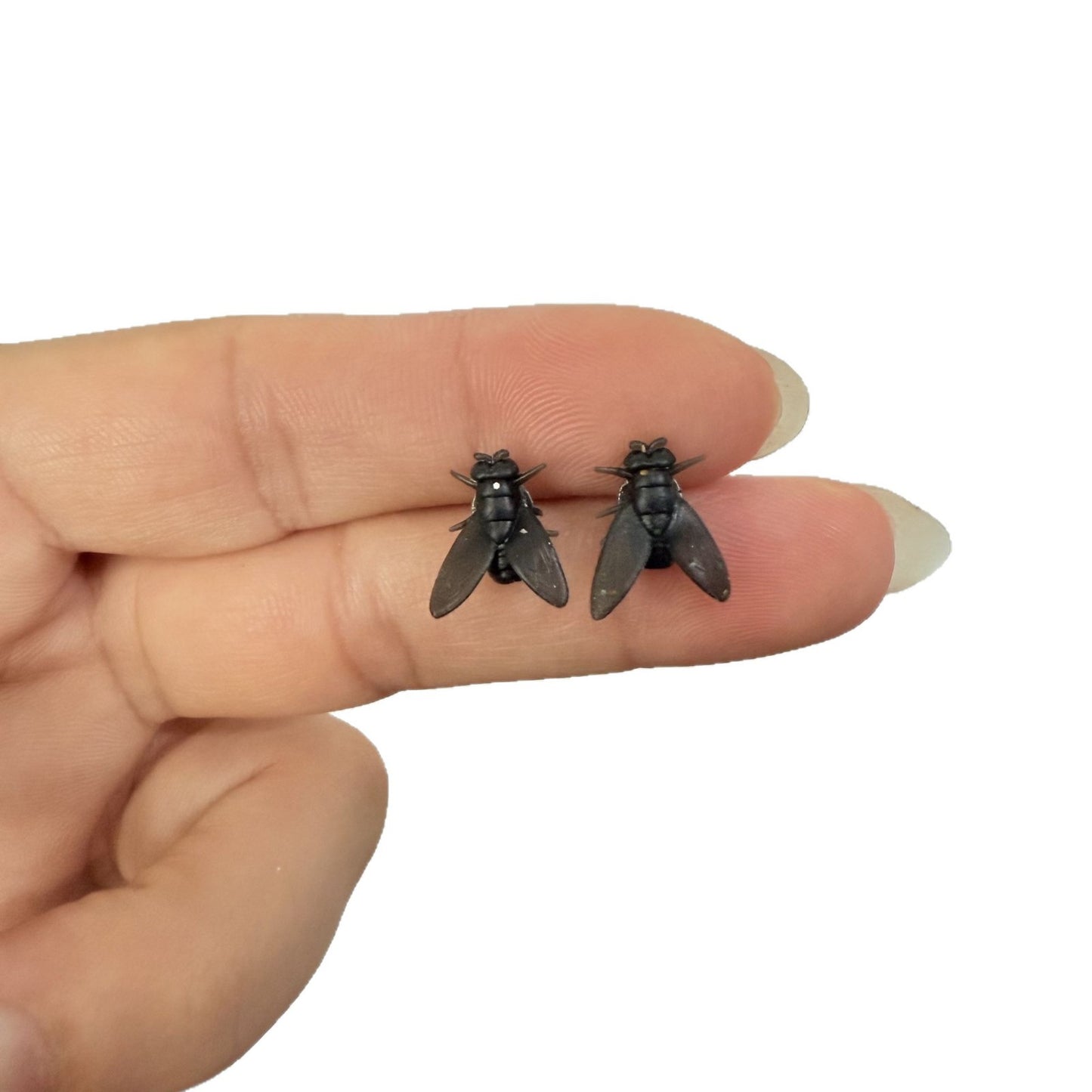 Simulation Mini Ohrringe – Schwarze Kleine Fliege
Einzigartige & stilvolle Ohrstecker für Damen und Herren